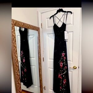 Gorgeous long evening gown with beautiful beaded details.